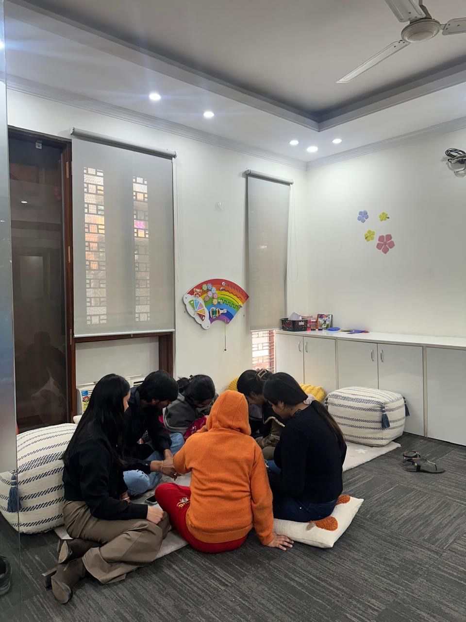 Children taking part in a guided group activity at Tomotina Kids
